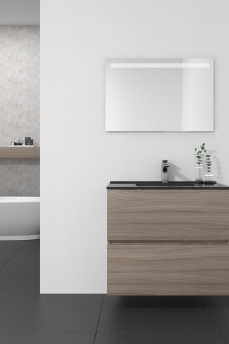 <p>
	Conjunto de mueble de baño realizado en material laminado de 19mm formado por dos cajones con sistema cierre suave . Lavabo en cristal templado de color negro y espejo con iluminación integrada incluidos.Grifo no incluido. Fabricado en España. </p>
