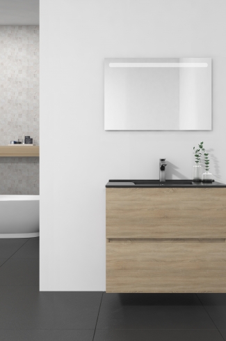 <p>
	Conjunto de mueble de baño realizado en material laminado de 19mm formado por dos cajones con sistema cierre suave . Lavabo en cristal templado de color negro y espejo con iluminación integrada incluidos.Grifo no incluido. Fabricado en España. </p>
