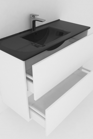 <p>
	Conjunto de mueble de baño realizado en material laminado color blanco de 19mm formado por dos cajones con sistema cierre suave . Lavabo en cristal templado de color negro y espejo con iluminación integrada incluidos.Grifo no incluido. Fabricado en España. </p>
